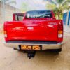 WhatsApp Image 2025-12-01 à 17.56.02_dbb05c47 toyota hilux rouge location cotonou