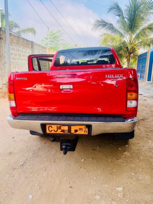 Toyota Hilux (Rouge)